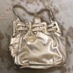 MK Gold purse
